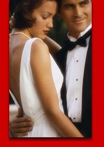 Well-dressed couple in formal evening attire, showcasing the quality of professional garment care